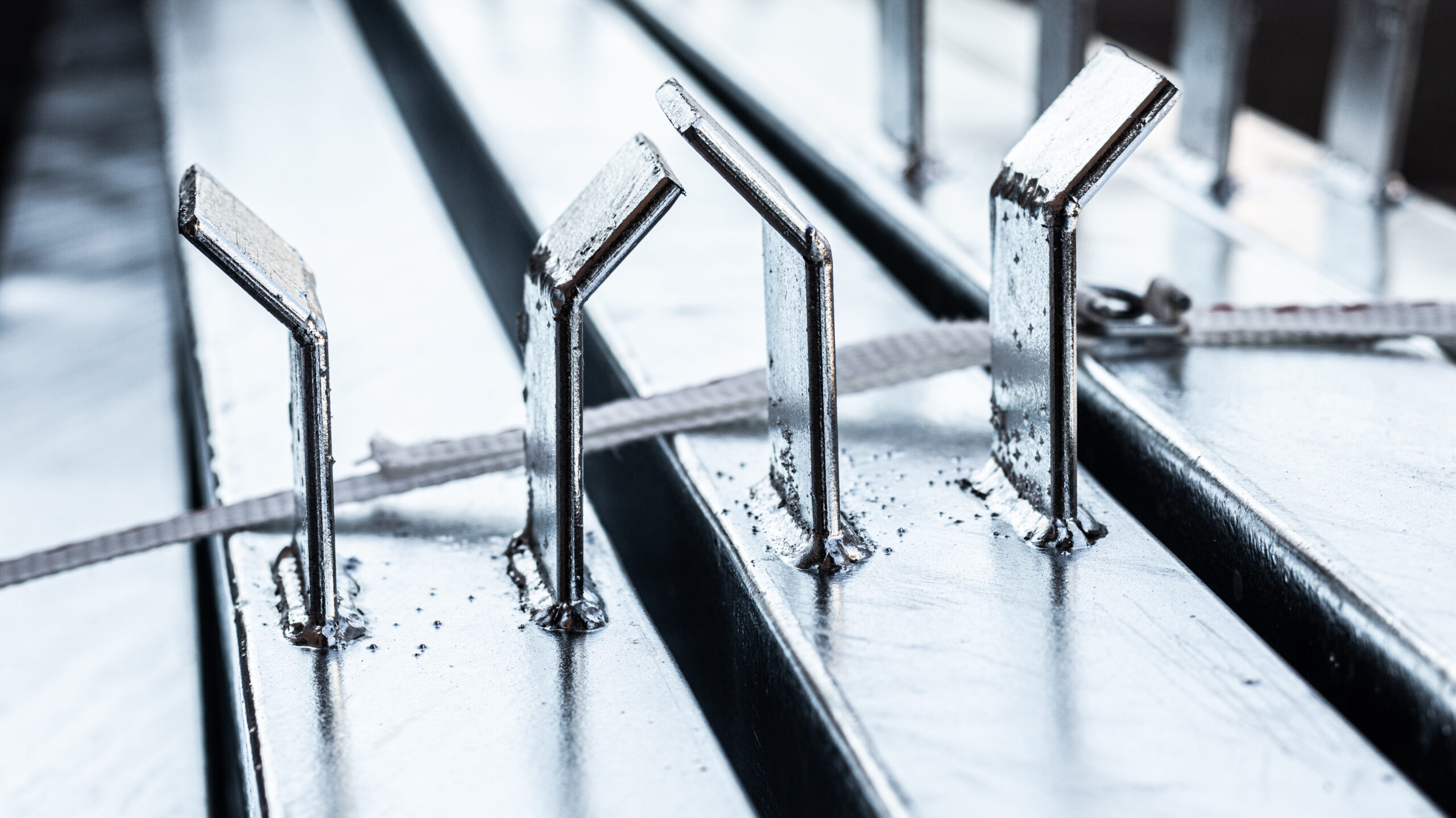 Close view of fabricated steel components and weld details